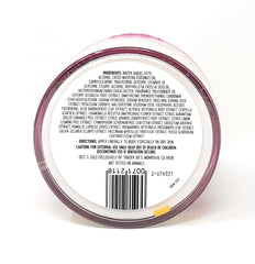 Trader Joe's body butter being scooped and applied to skin demonstrating easy absorption