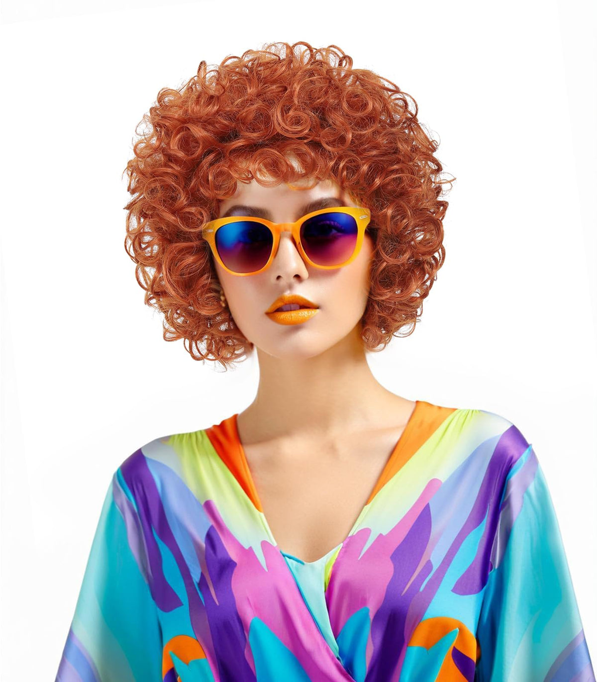 Traqur front view of orange afro wig showing bold retro silhouette and instant impact