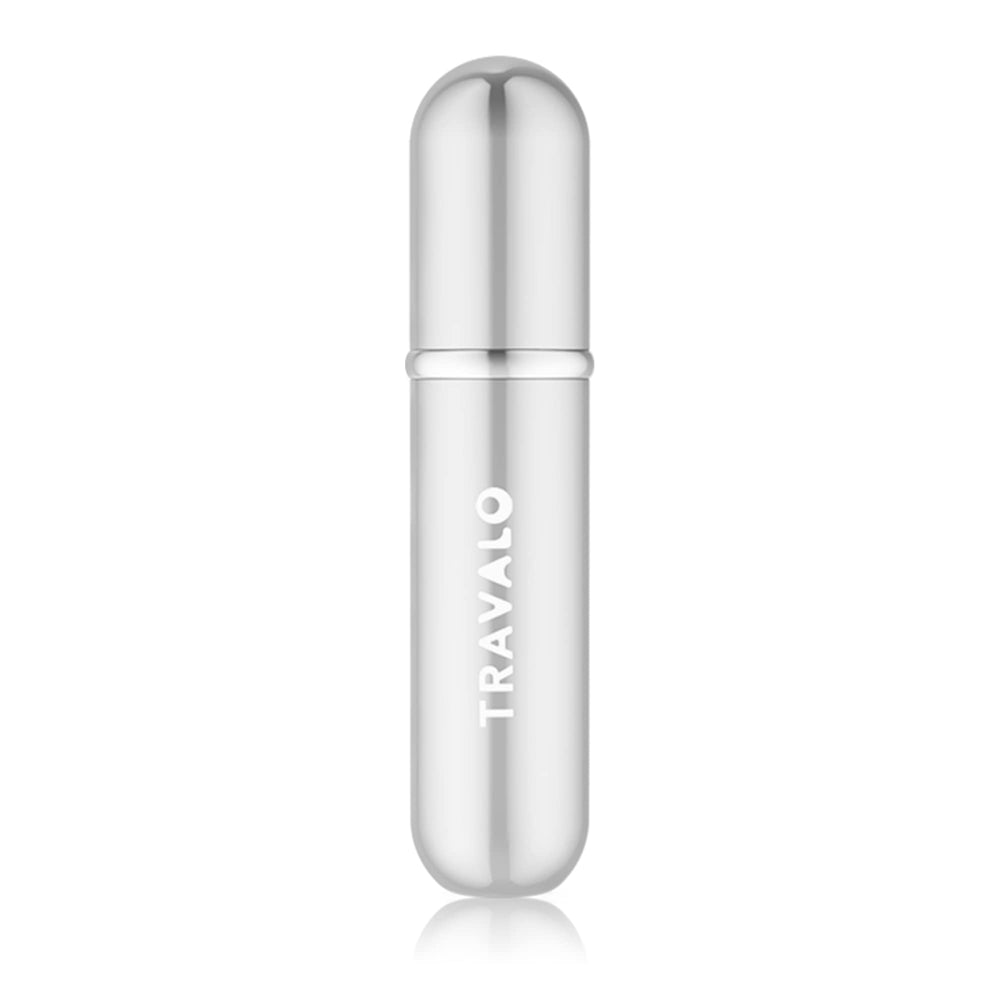 Demonstration of pumping Travalo from perfume bottle showing quick direct refilling benefit