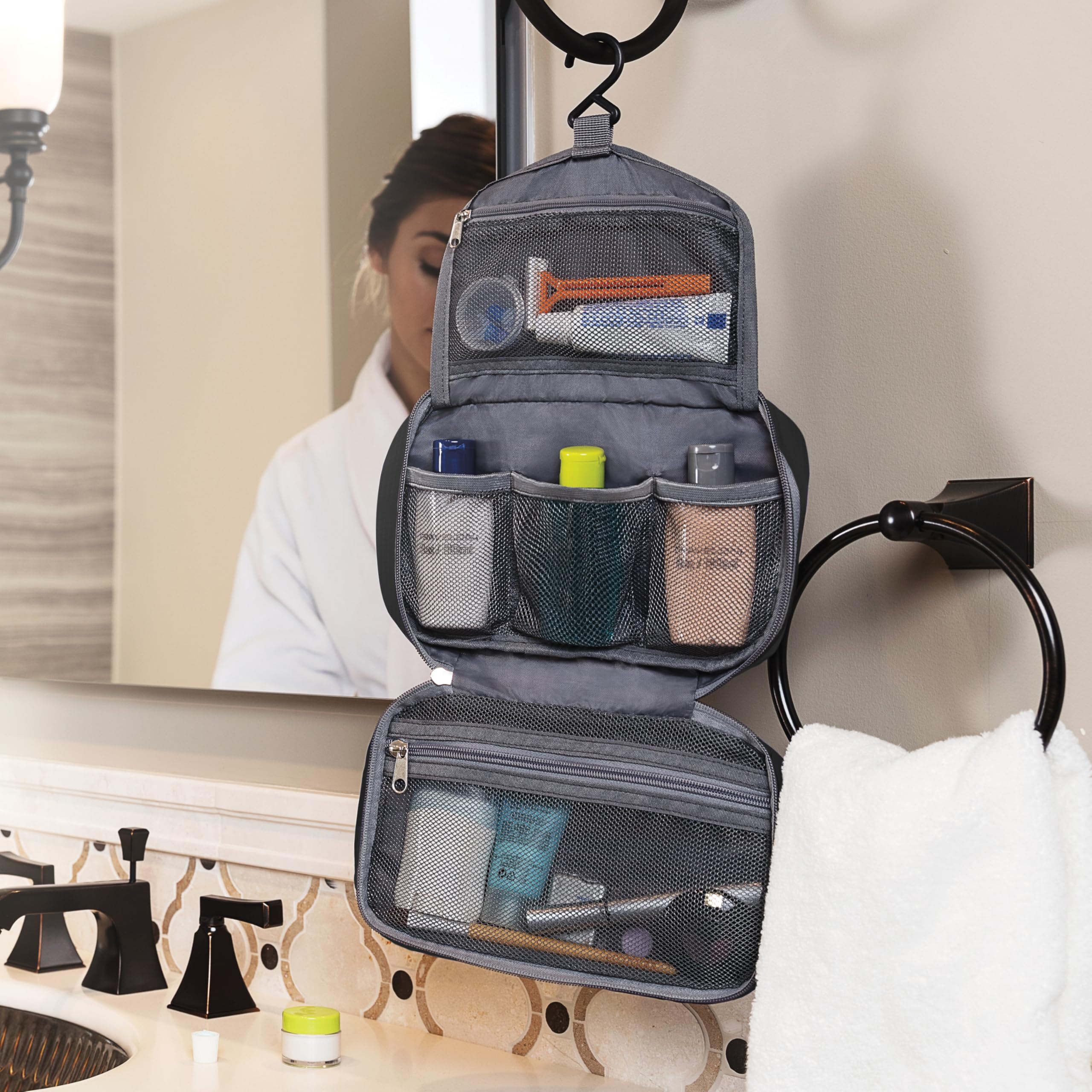 Travelon top zip pocket with comb and razor protecting small items on trips