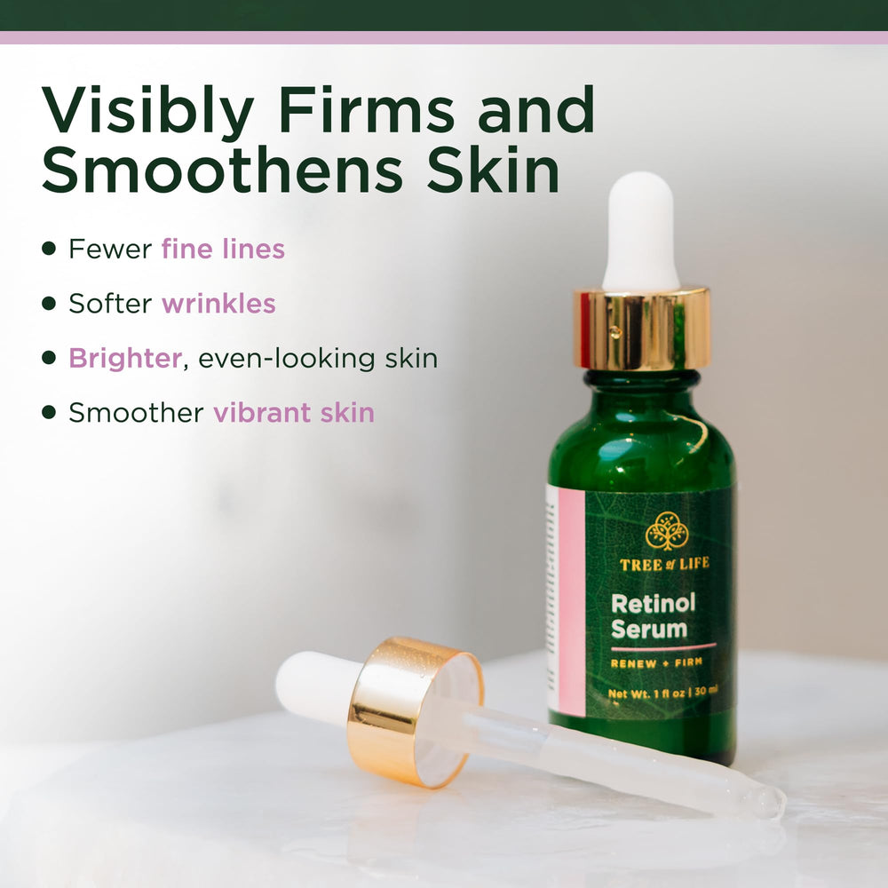 Tree of Life retinol night serum held in hand indicating restorative evening use