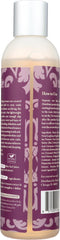 Treluxe bottle cap and dispenser close-up demonstrating controlled product release