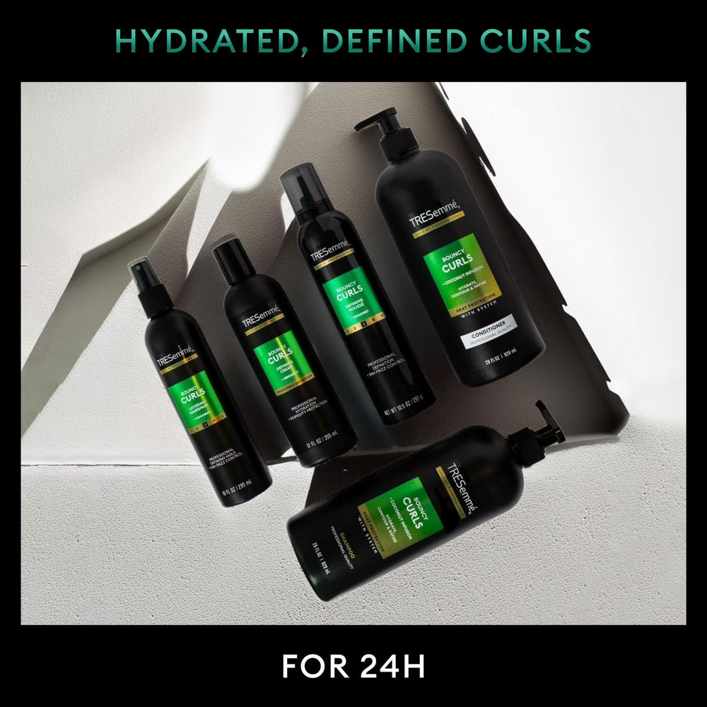 TRESemmé styled bouncy curls showing volume and frizz control