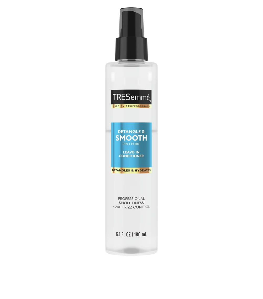 TRESemmé being applied to damp hair, improving combing and manageability