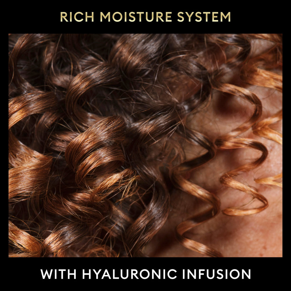 TRESemmé in-shower use on wet hair demonstrating detangling benefit