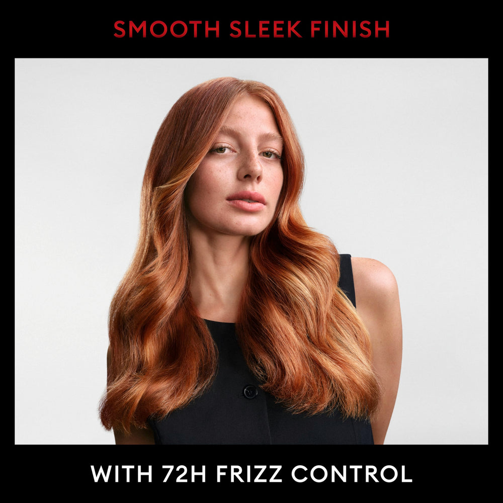 TRESemmé conditioner applied to wet hair during shower for frizz control