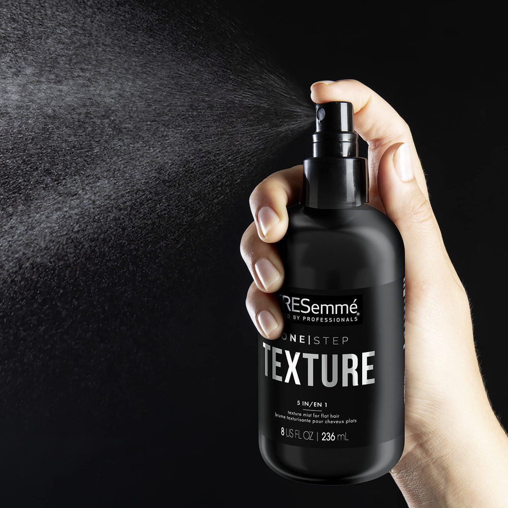 TRESemmé bottle in hand illustrating 8 oz size for travel and home use