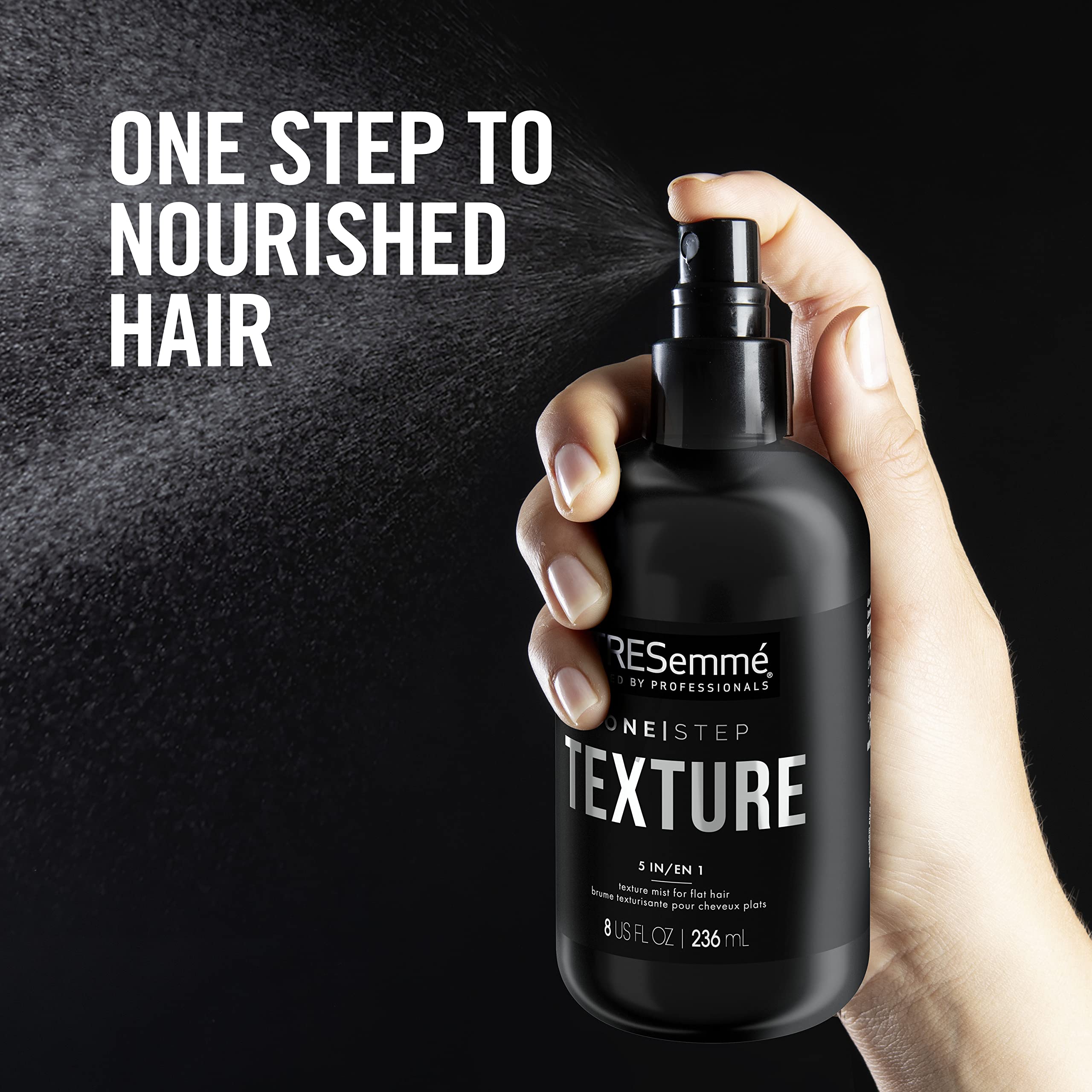 TRESemmé mist being sprayed on damp hair to create beachy movement
