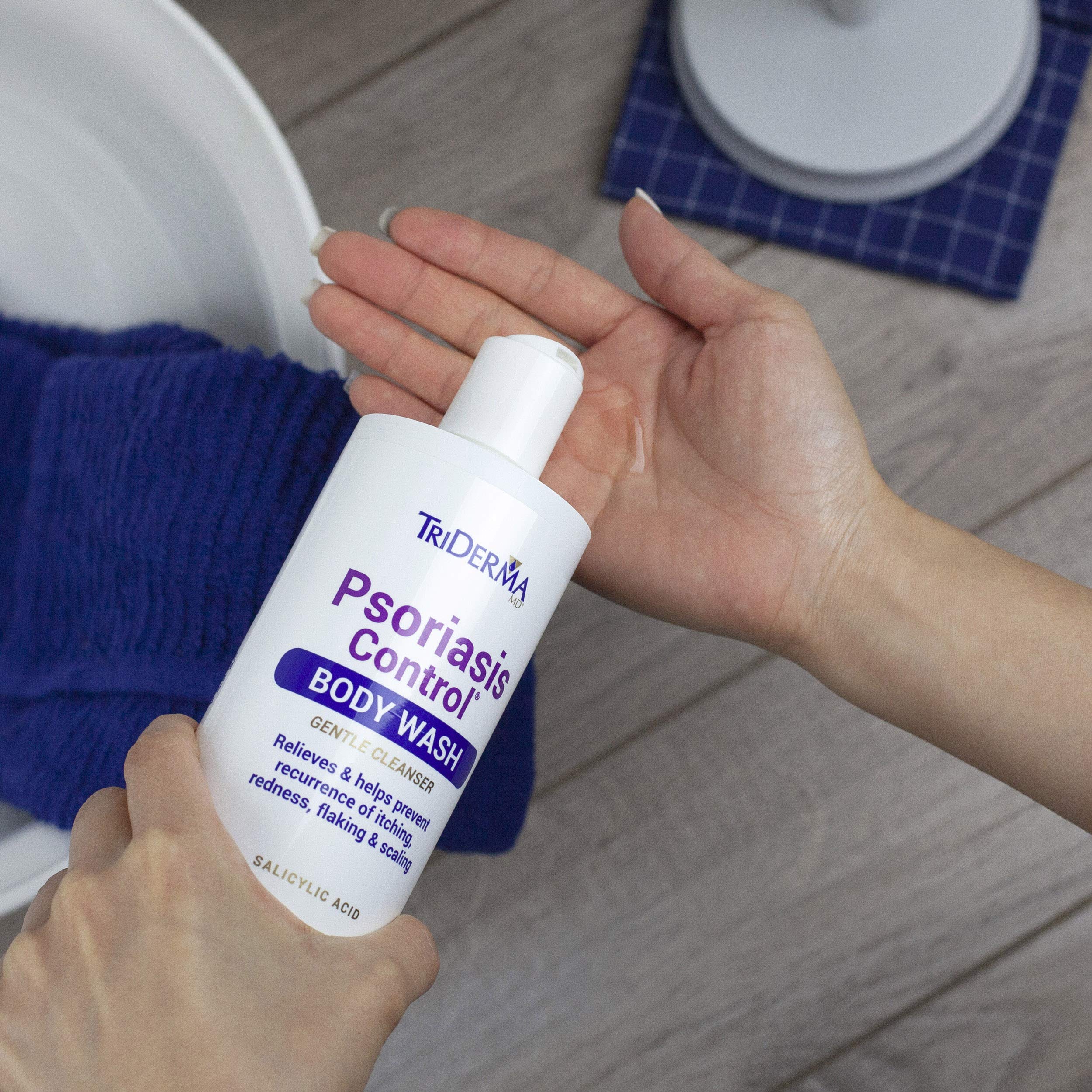 Person using TriDerma in shower showing rinsable relief