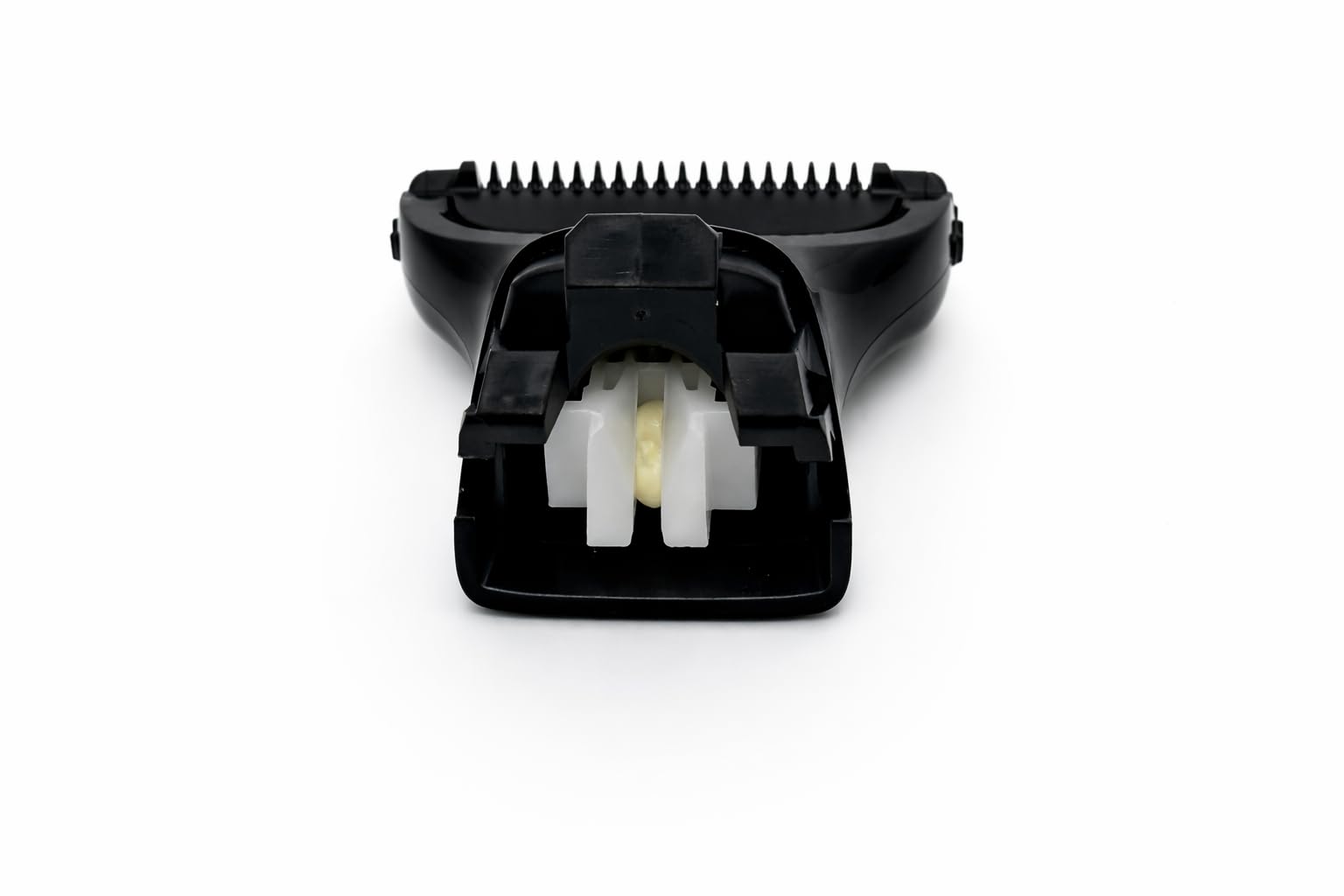 Trimmer replacement head in bathroom setting for convenient grooming upkeep