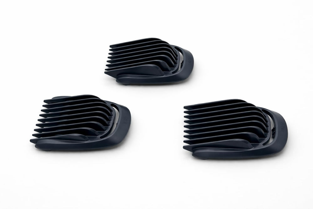 Included small comb next to guards showing Trimmer easy touch-ups