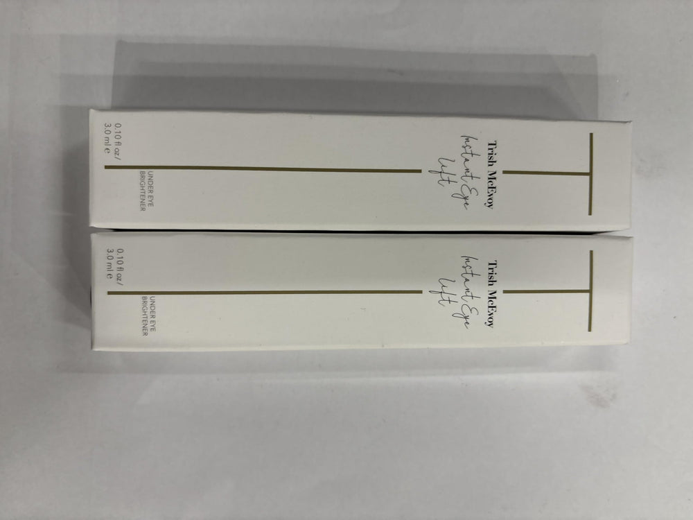 Trish McEvoy Instant Eye Lift scale next to coin illustrating compact 3 ml size ideal for travel