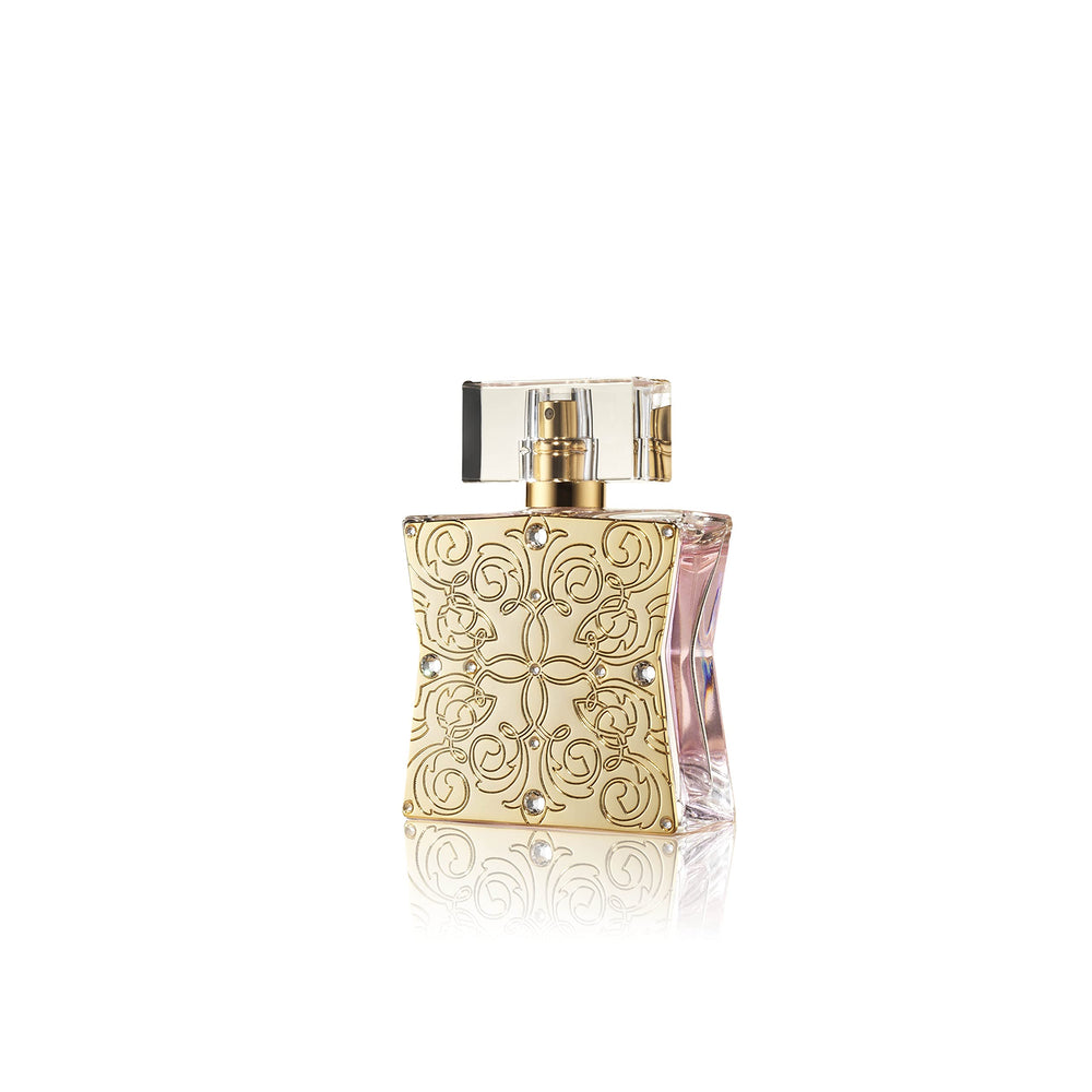 Tru Fragrance Beauty close-up spray nozzle capturing fine mist for controlled application
