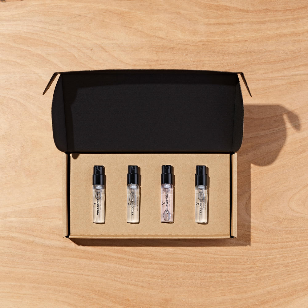 Tru Fragrance Beauty Yellowstone Ride cologne spray nozzle with droplets conveying smoky warmth