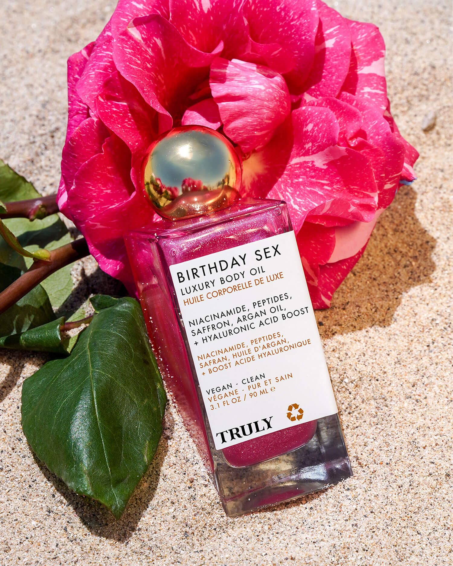 Truly bottle staged on vanity showing luxe lifestyle and morning ritual enhancement
