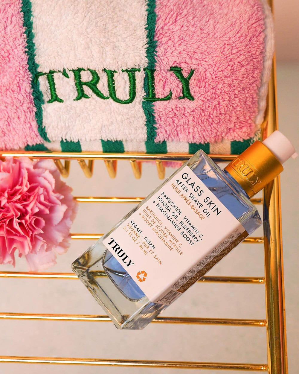 Truly bottle beside razor showing ideal post-shave step benefit