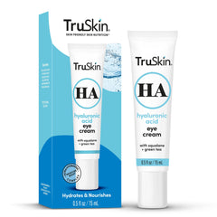 TruSkin eye cream held in hand to show compact size and travel-friendly benefit
