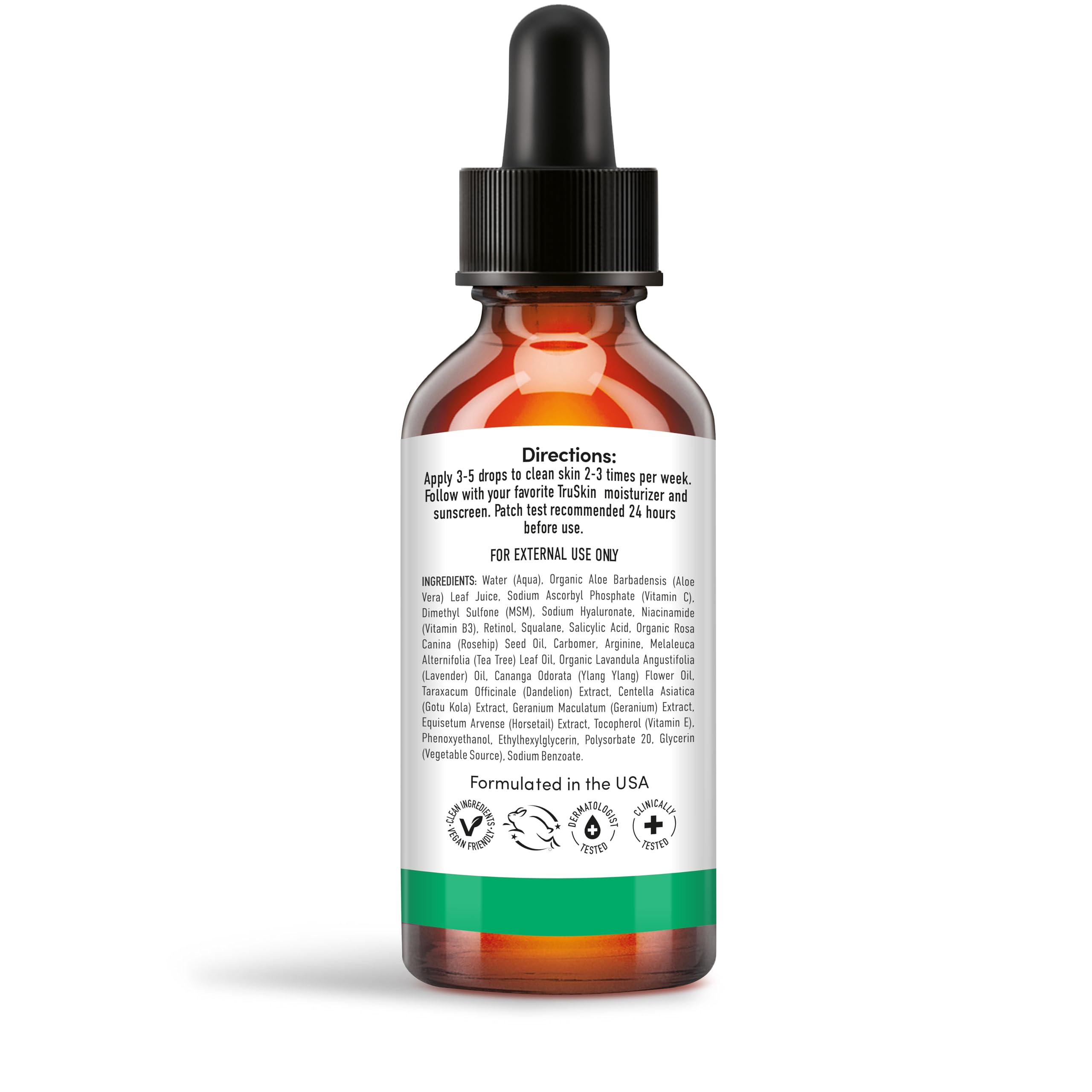 Applying TruSkin serum near mirror in natural light to show application step and skin compatibility