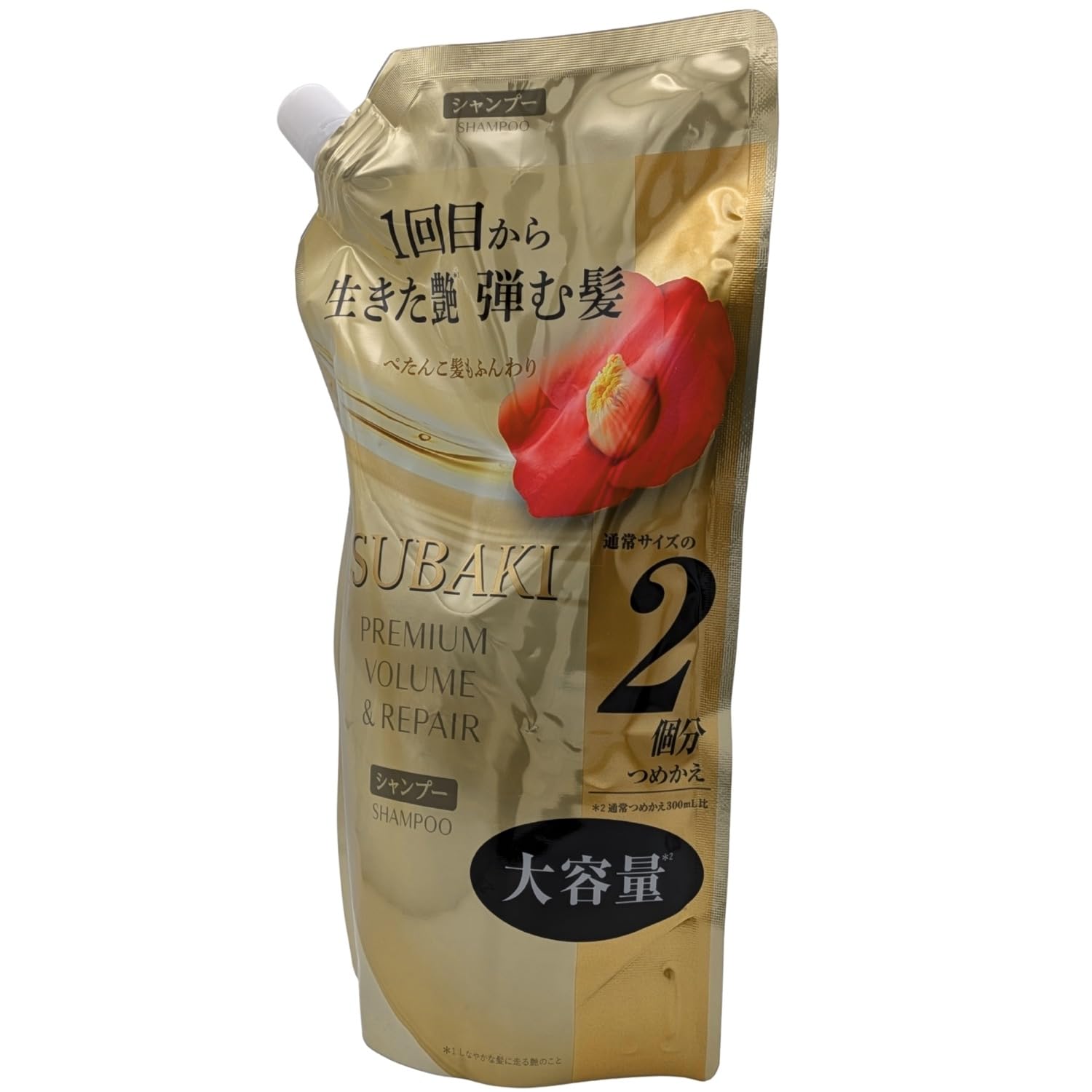 ファイントゥデイ TSUBAKI refill next to hand showing 600ml size and value