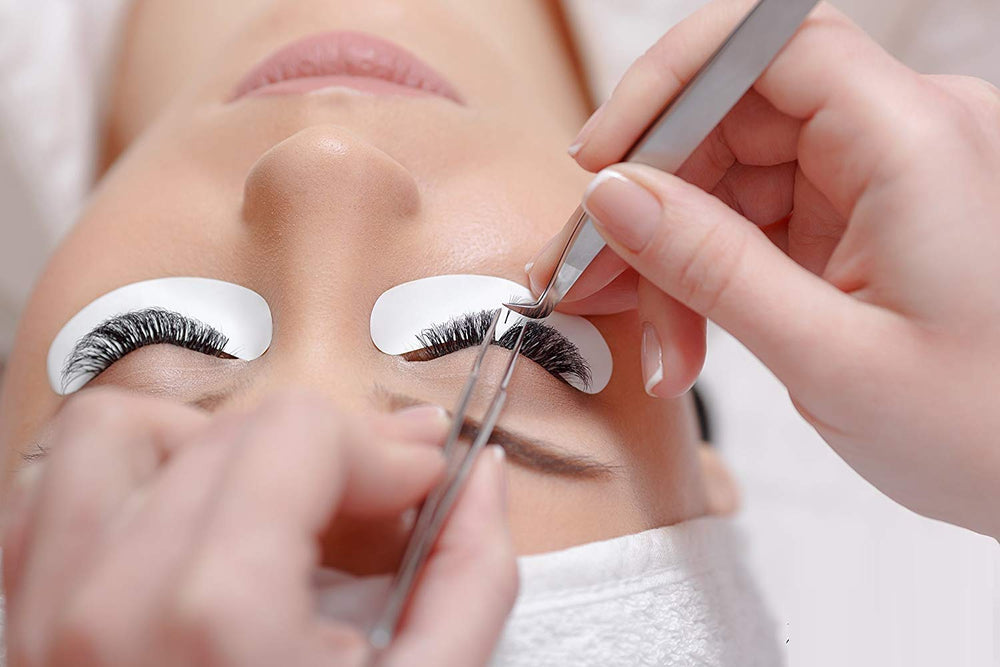 TUBeauty Sky Glue S+ arranged in a professional lash technician kit