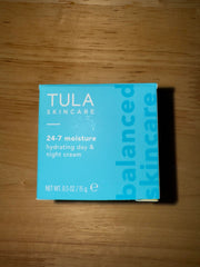 TULA jar open with visible cream highlighting smooth finish for daily use