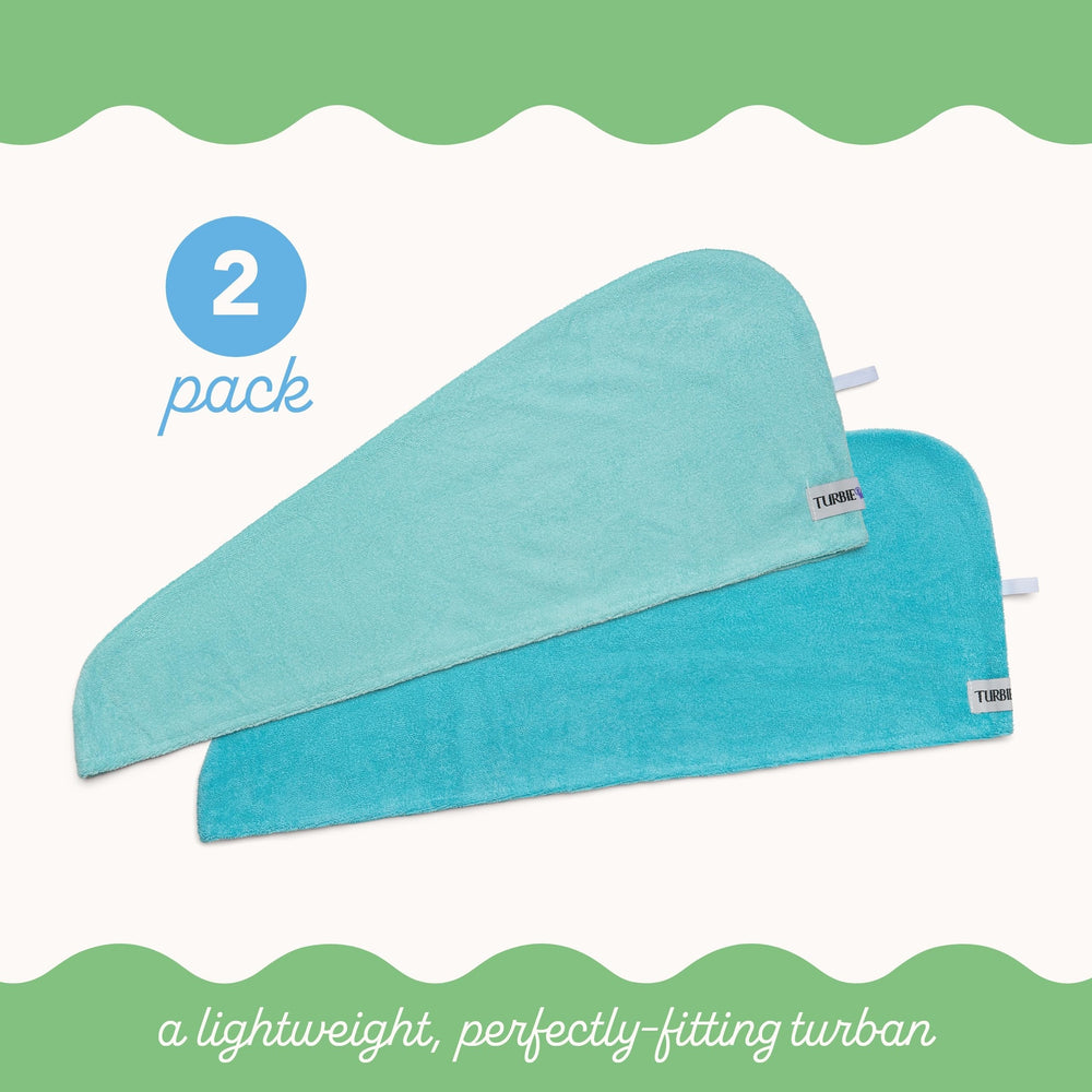 Turbie Twist towel worn in bathroom mirror showing easy everyday use