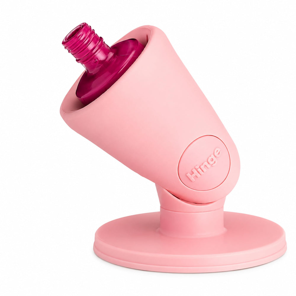 tweexy front view of blush hinge holder showing stable bottle positioning