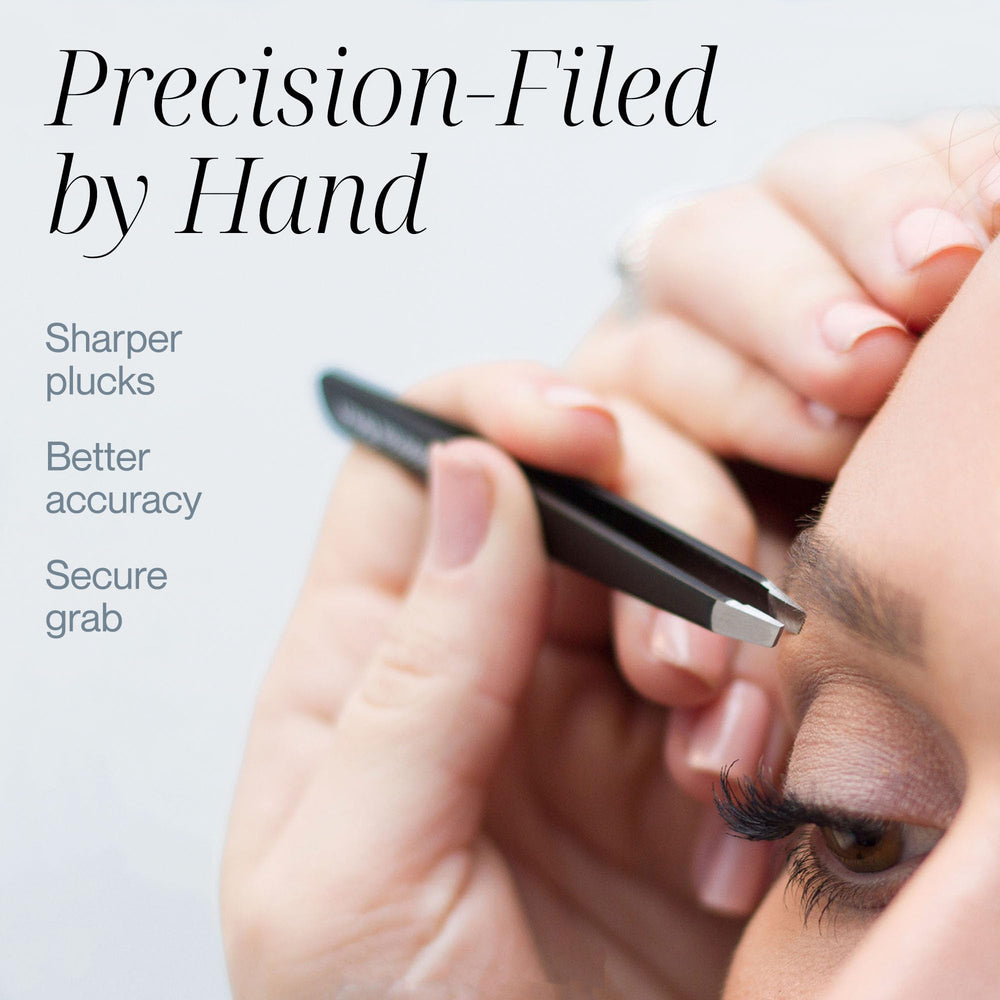 TWEEZER GURU held in hand to show scale and comfortable grip