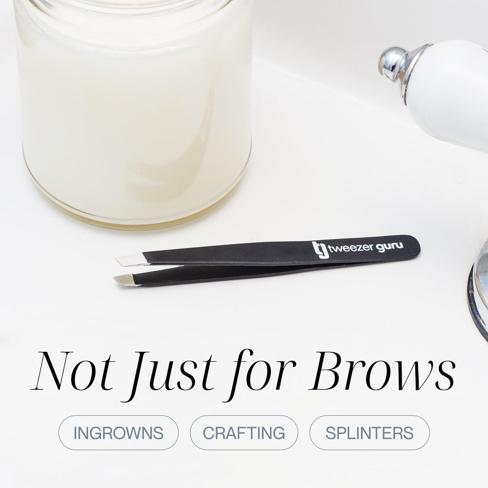 TWEEZER GURU on bathroom vanity showing travel-ready grooming kit