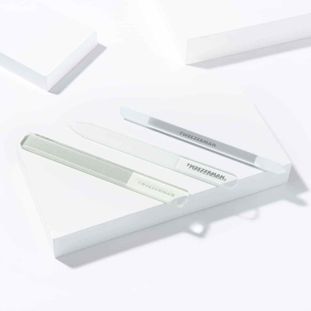 Tweezerman buffer polishing a nail to a reflective, healthy-looking shine