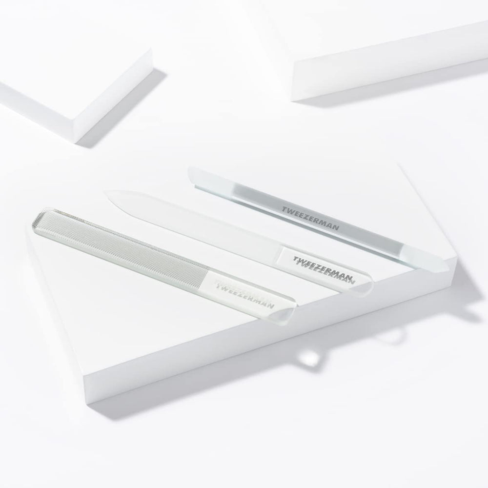 Tweezerman buffer polishing a nail to a reflective, healthy-looking shine