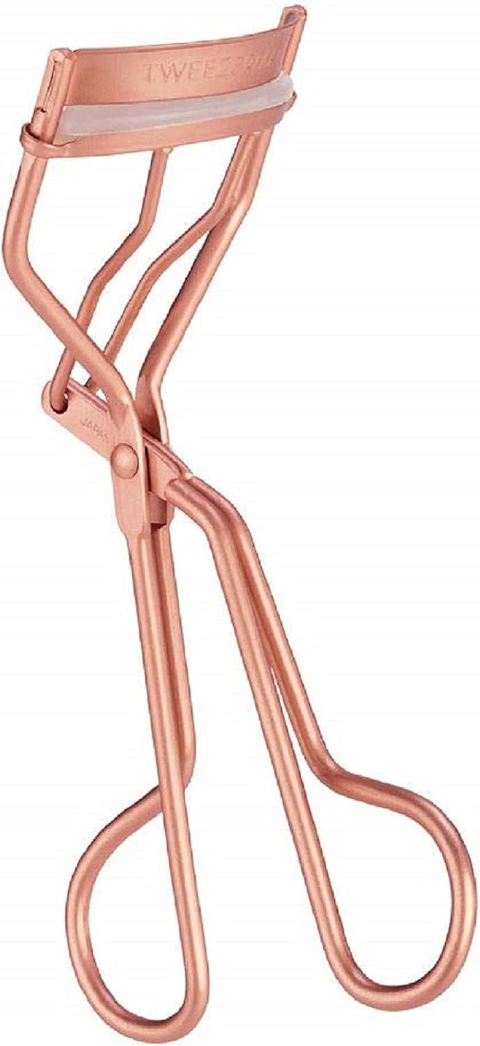Tweezerman rose gold curler front view showing sleek design and professional curl benefit