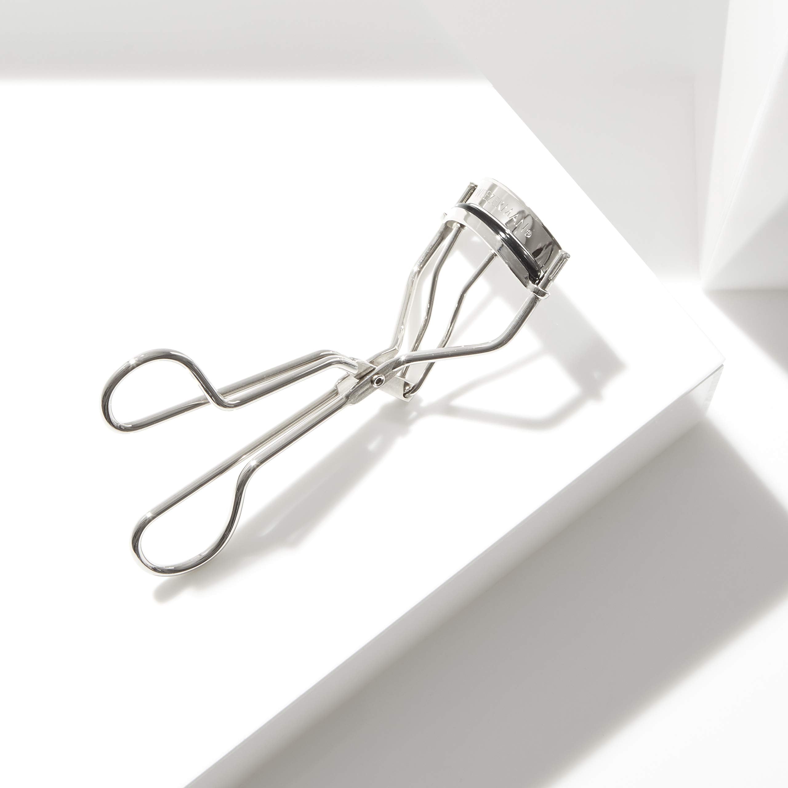 Tweezerman curler usage demo depicting proper placement for even lift benefit