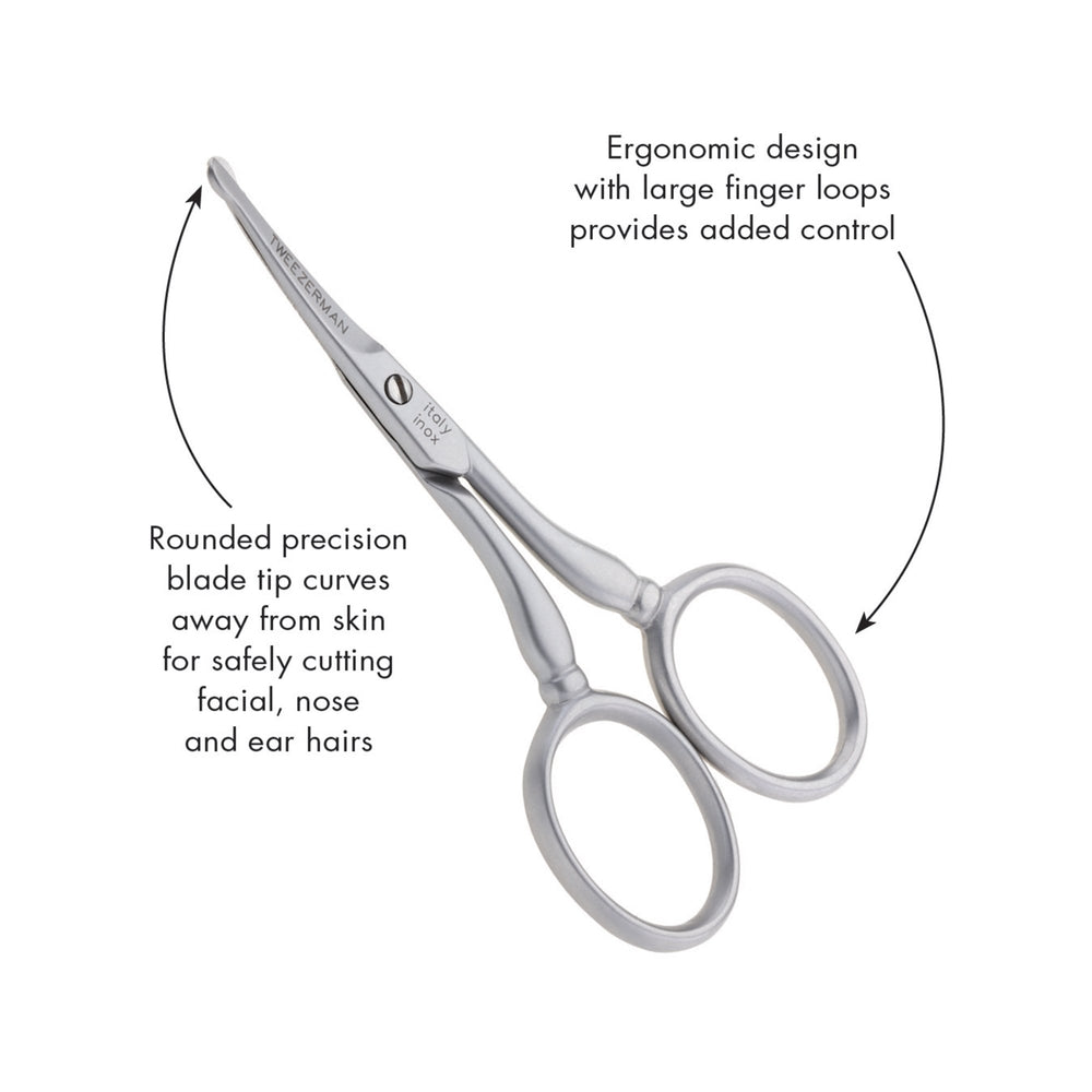 Tweezerman curved blade detail showing precision edge for tight-area trimming