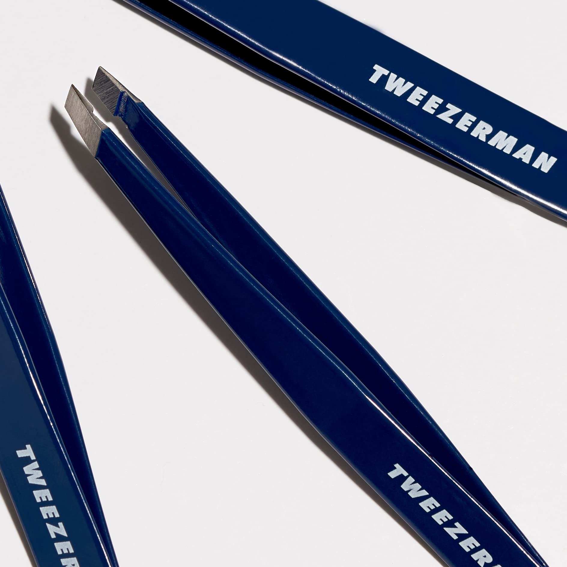 Tweezerman evening blue with award badge showcasing beauty industry recognition