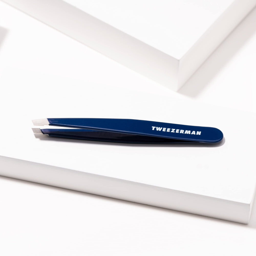 Tweezerman evening blue packaged lifestyle shot highlighting premium finish