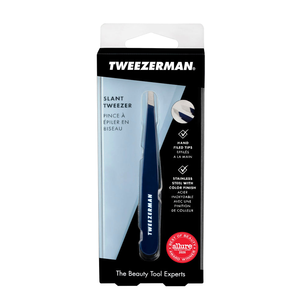 Tweezerman evening blue next to travel pouch for organized on-the-go grooming