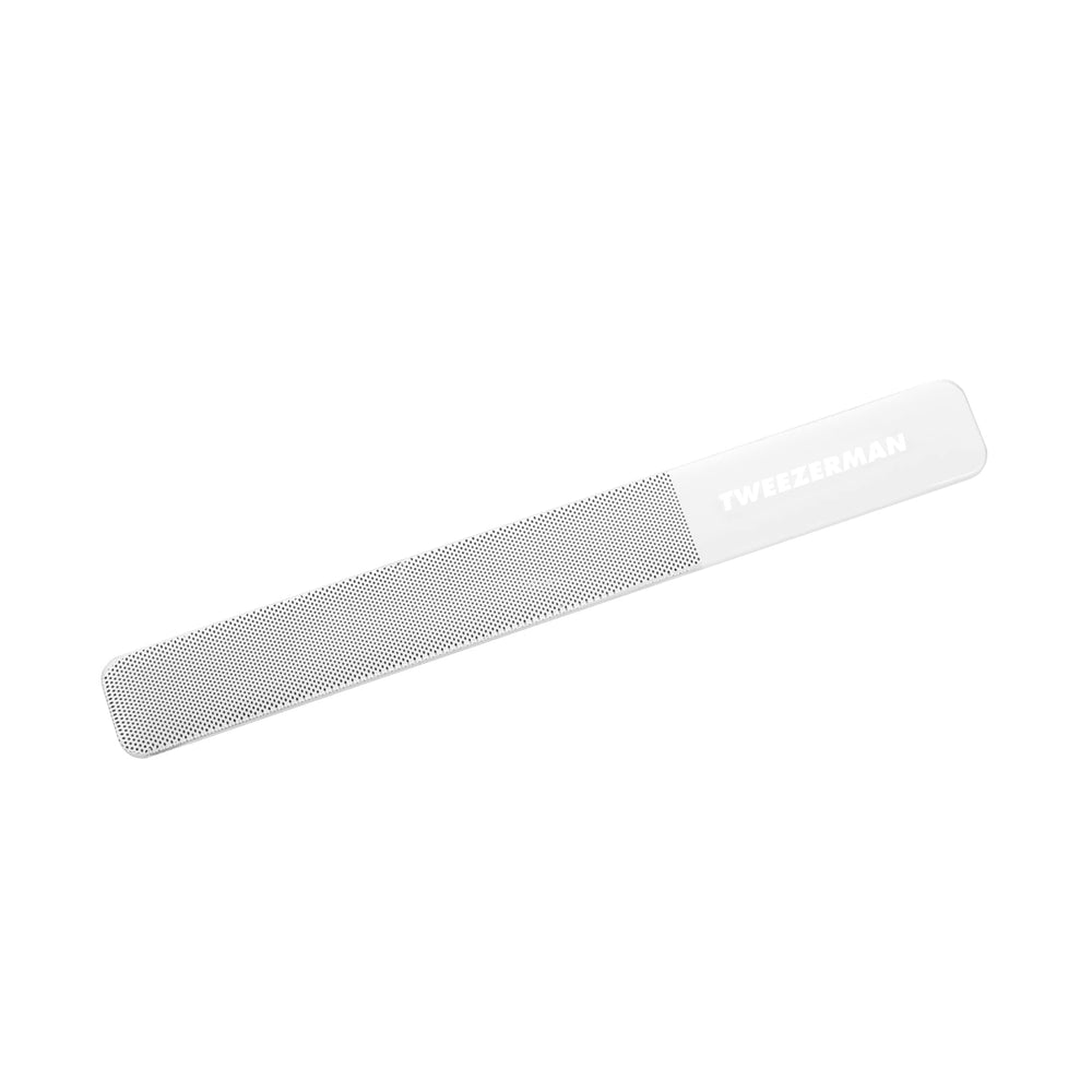 Tweezerman glass nail buffer front view showing compact design and durable glass