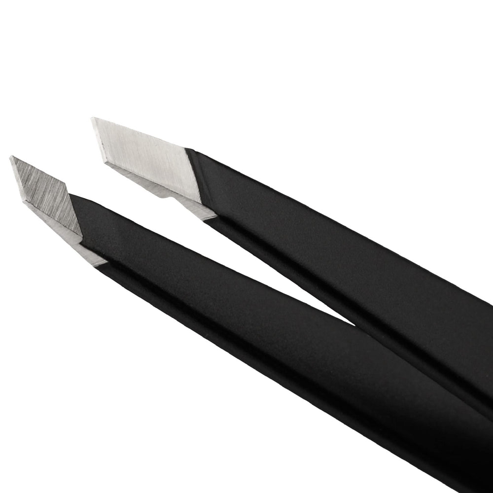 Tweezerman close-up of hand-filed tip demonstrating precise hair capture benefit