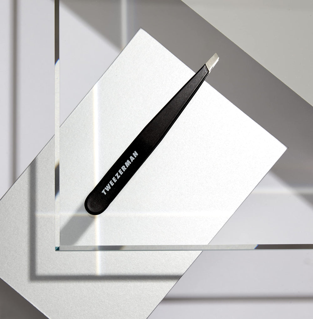 Tweezerman textured stainless-steel finish highlighting durable easy-clean benefit