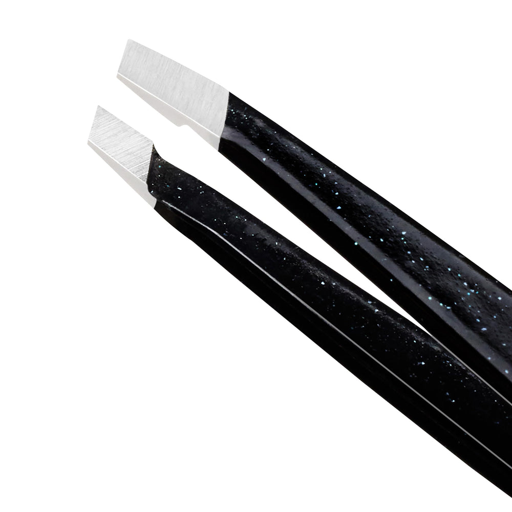 Tweezerman mini slant angled closed highlighting durable alignment and portability