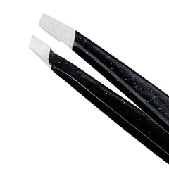 Tweezerman mini slant angled closed highlighting durable alignment and portability