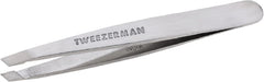 Tweezerman mini slant front view showing compact ergonomic shape and precise grip