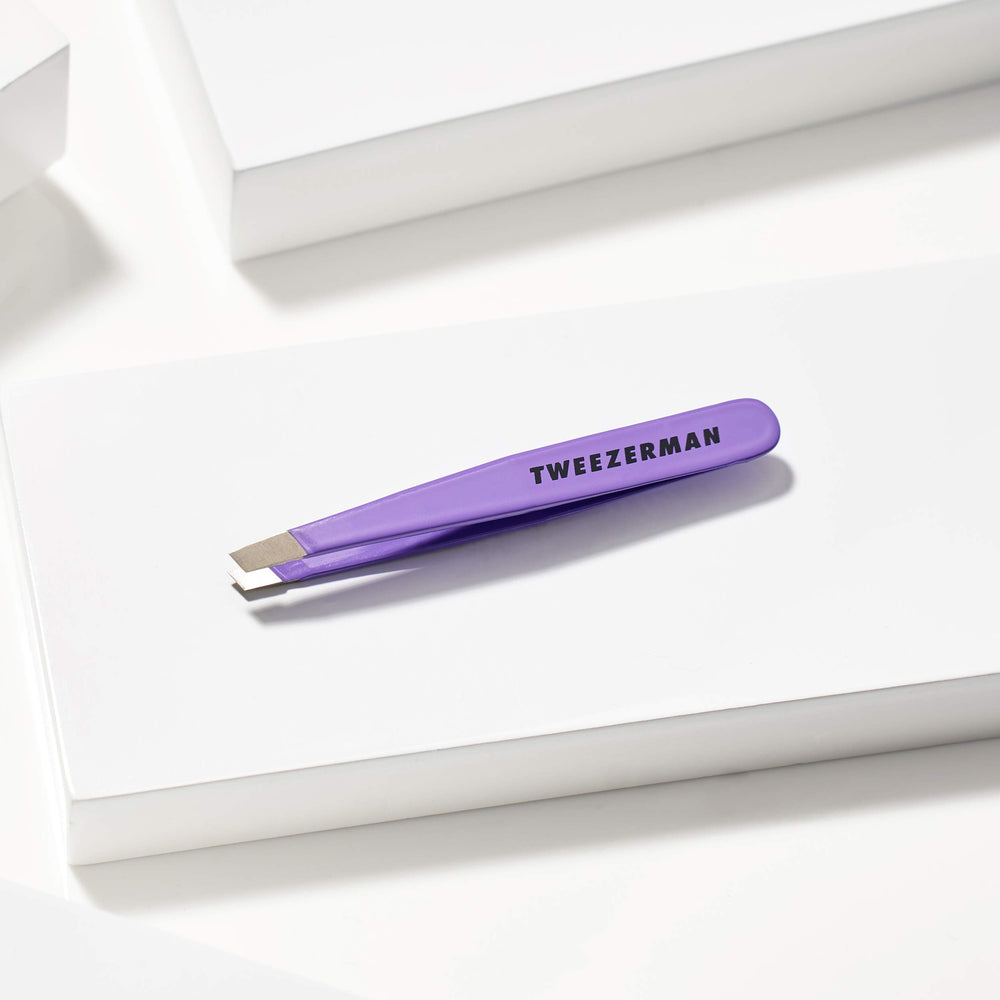Tweezerman lilac finish detail demonstrating durable coating and stylish portable design