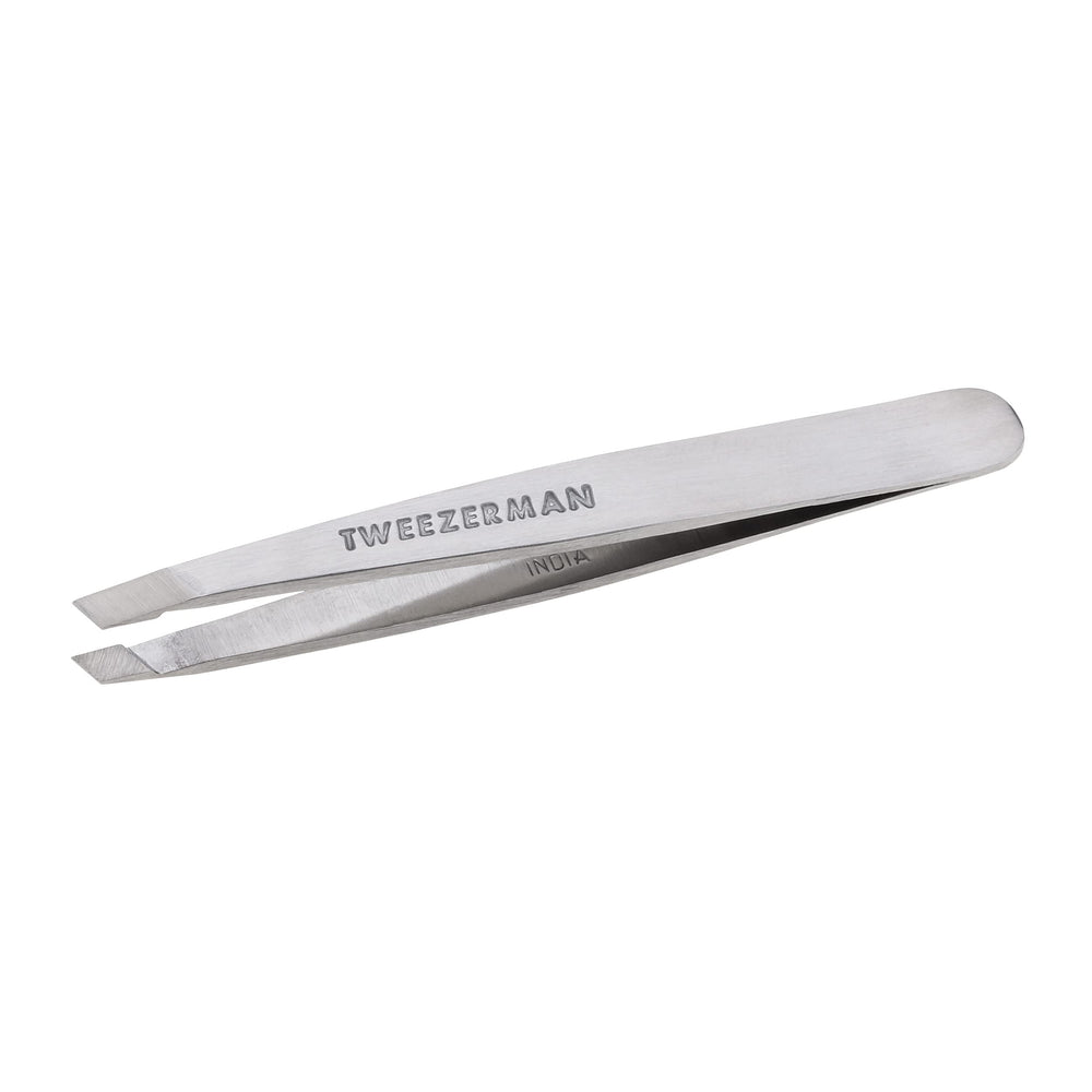 Tweezerman product packaging with included care instructions and brand logo