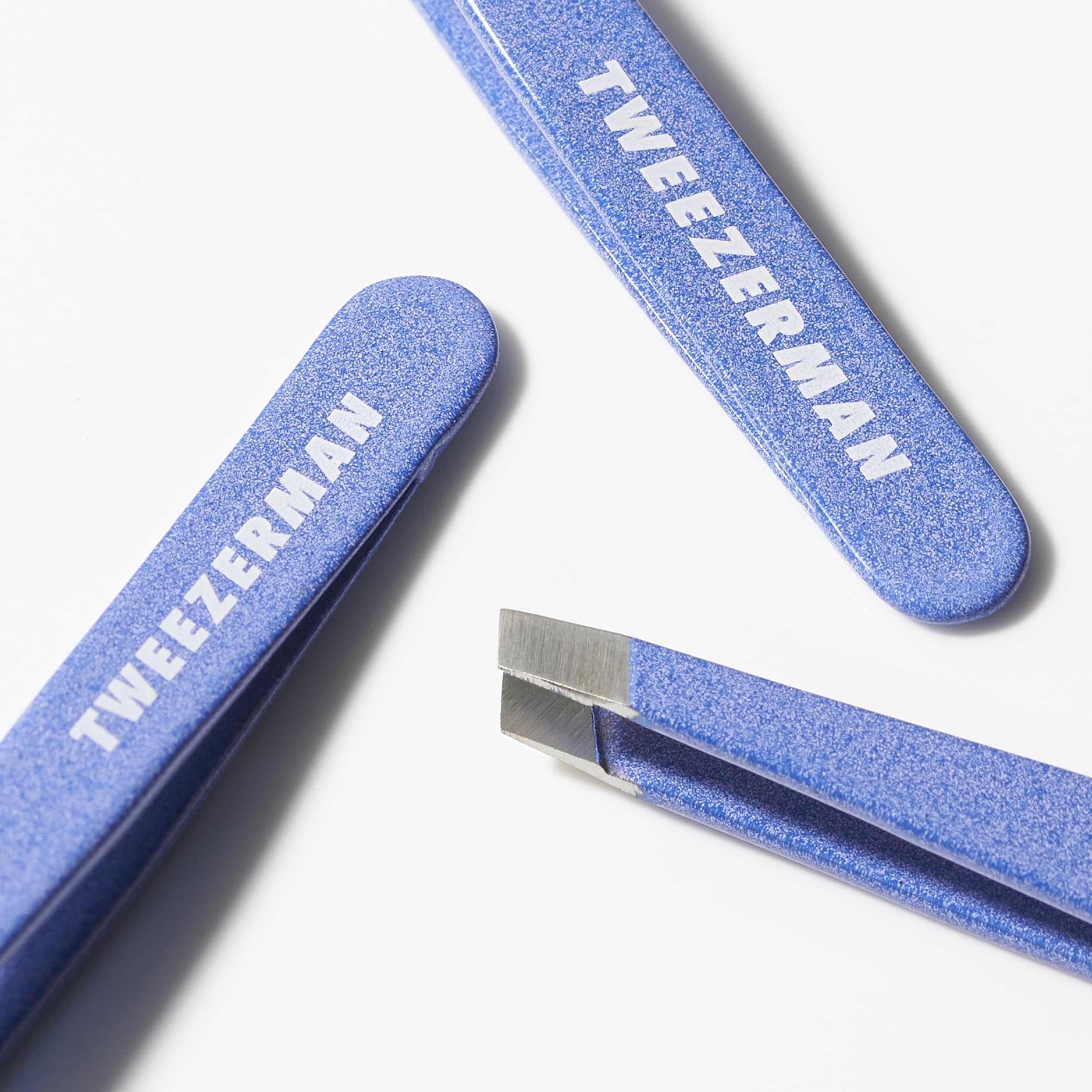 Tweezerman Mini Slant with packaging highlighting travel-ready convenience
