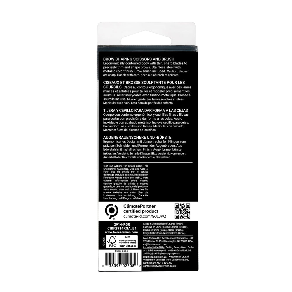 Tweezerman packaging and contents laid out showing included scissors and spoolie