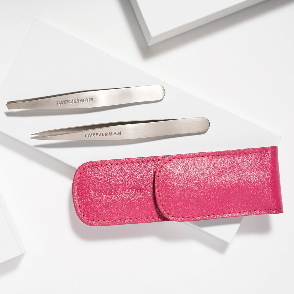 Tweezerman pink travel pouch zipper closeup protecting tools on the go