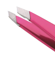 Tweezerman point tip close-up showing fine tapered tip for single-hair removal