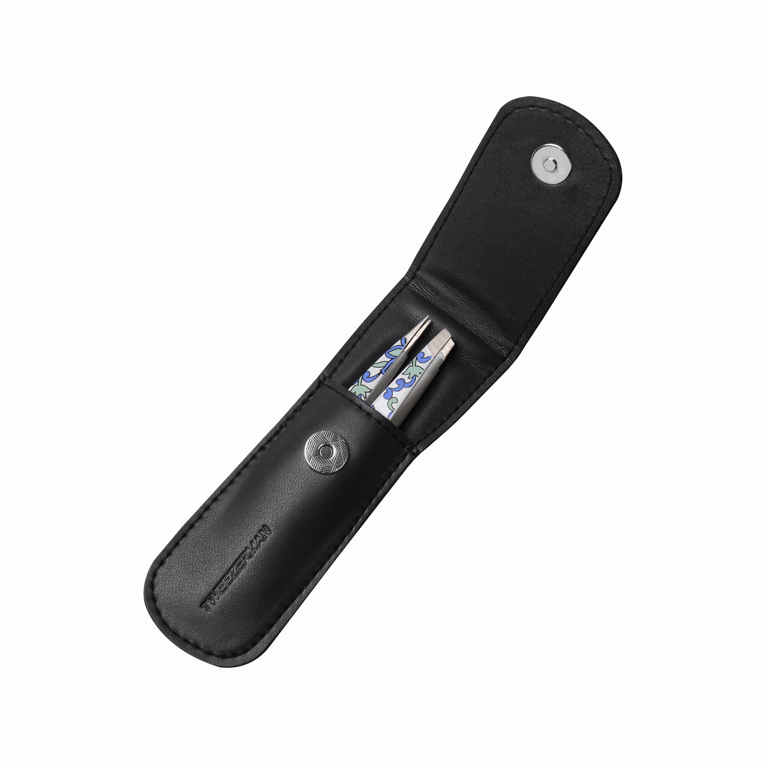 Tweezerman point tweezer close-up highlighting precision for fine hairs
